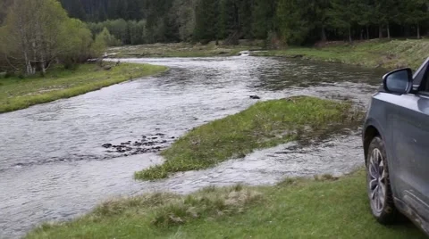 Car by mountain river Stock-Footage 63378851