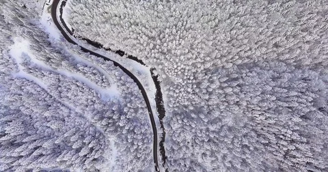 Car On A Mountain Road In The Winter Stock Footage 84928158