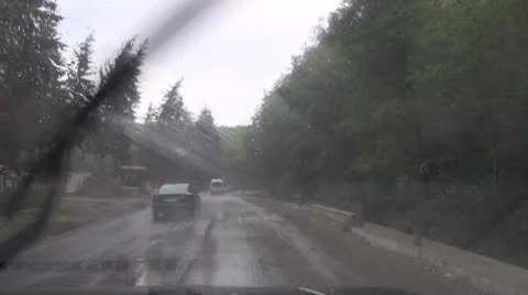 By car on mountain roads in rain Stock-Footage 25605813