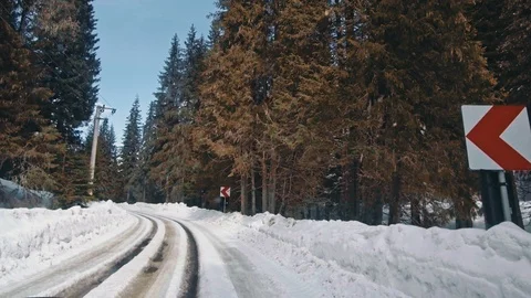Car on mountain winter road Stock Footage 87228193