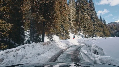 Car on mountain winter road Stock Footage 87228850
