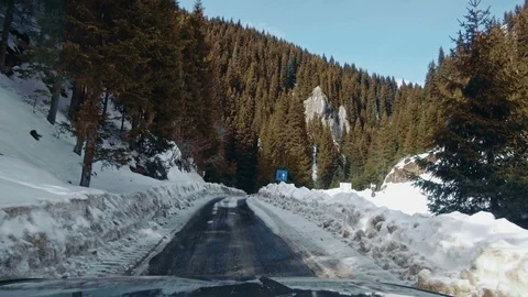 Car on mountain winter road Видео 87228854