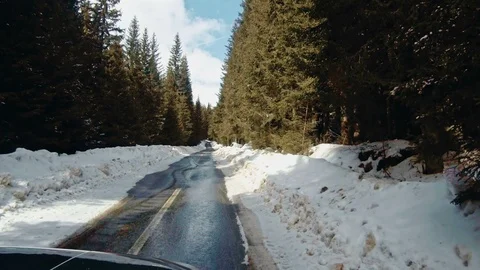 Car on mountain winter road Stock Footage 87229363