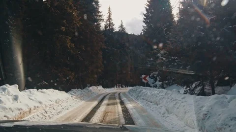 Car on mountain winter road Stock Footage 87229994