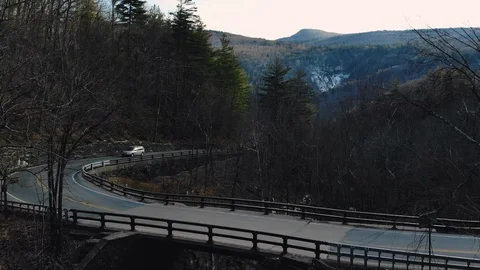 Car in the mountains cinimatic turn Stock Footage 89710759