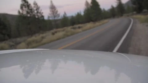 Car mounted camera, car passes on mountain road Stock Footage 56343914
