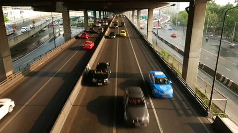 Car move towards, pass under camera, highway road under elevated viaduct Stock Footage 55278875