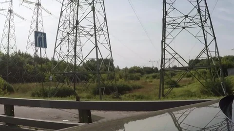 Car move under power lines Stock Footage 84600191