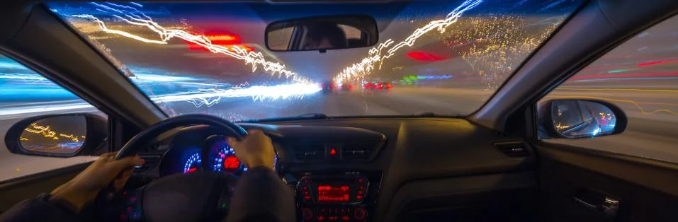 The car moves at the night. Stock Photos