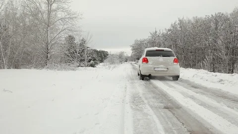 Car Moves Reverse In Winter Snow Covered Forest Stock Footage 124595288
