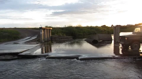 Car moves through the water Stock Footage 59827688
