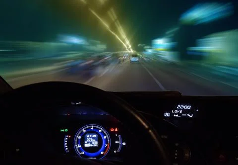 Car moving on highway at night Stock Photos