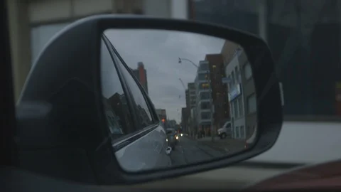 Car Moving Looking At Side Mirror Stock-Footage 115861518