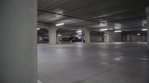 Car moving in a parking area Stock Footage 71535089