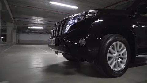 Car moving in parking area Stock-Footage 71535562