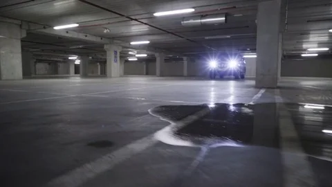 Car moving in a parking area Stock Footage 71535756