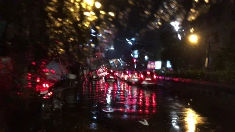 Car moving in a rain and outside blurred view from the windscreen of the car Video stock 104841307