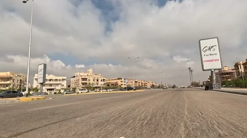 Car Moving Through Bright Urban Roads New Cairo Showing Buildings Traffic Stock Footage 330104390