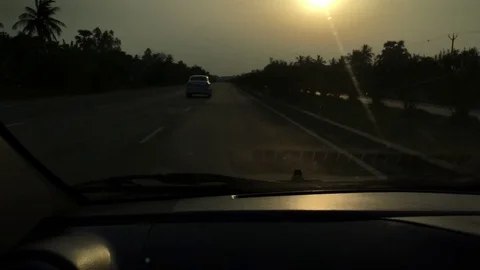 Car moving through highway in sunset time Video stock 98918369