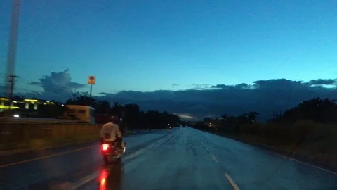 Car moving through highways at blue hour Stock Footage 115778234