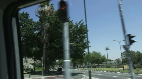 Car Moving Through a Residential Area. Palm Trees Stock Footage 88886310