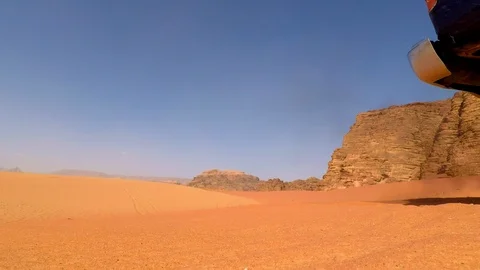 Car moving toward the camera in desert Stock-Footage 103210556