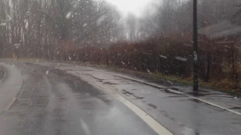 A car moving under the snow Stock Footage 81142585