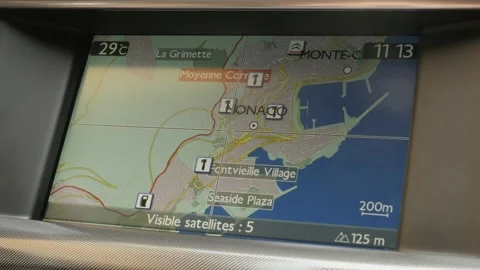 Car navigation system adjusting to Monaco area Stock Footage 91386261