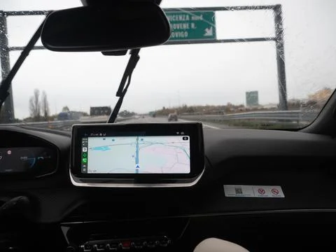 Car navigation system on dashboard with map on screen Stock Photos