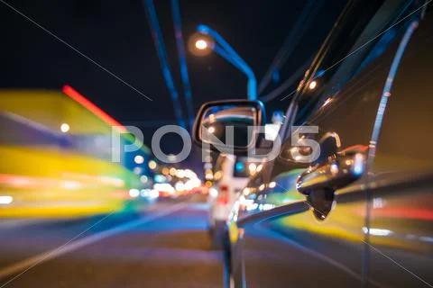 The car in the night time, side camera location on the car body Stock Photos