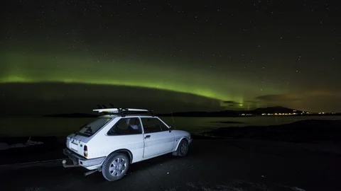 Car with northern lights Stock Footage 99607885