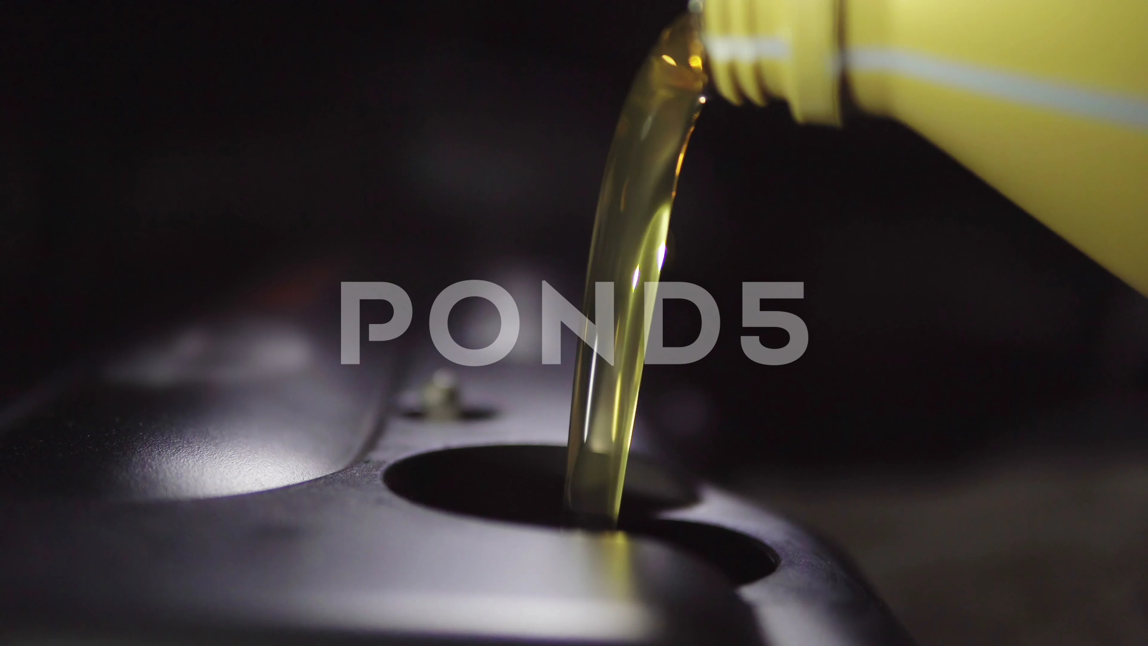 motor-oil-pouring