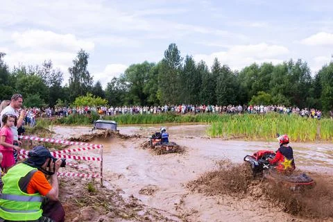 The car overcomes difficult obstacles. Large-scale sports competitions Stock Photos