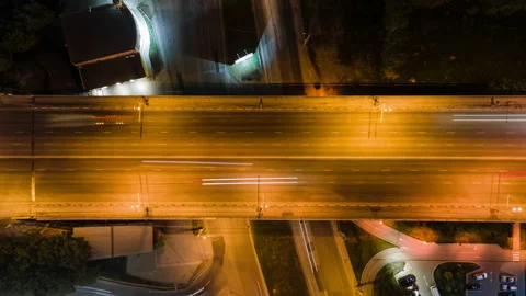 Car overpass at night. The upper angle of shooting on a quadcopter. Lights of Stock Footage 196870492