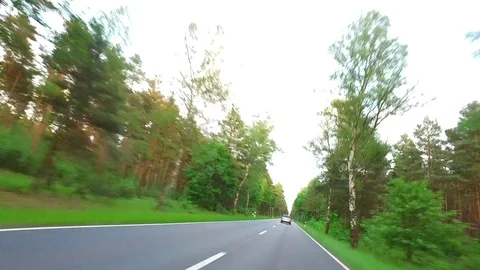 Car Is Overtaking On a Road - POV - Time Lapse Stock Footage 84577170