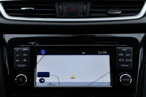 The car panel. A built computer screen with a navigator and an emergency stop Stock Photos