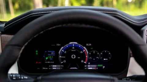 Car panel, digital bright speedometer, odometer and other tools. Stock Photos