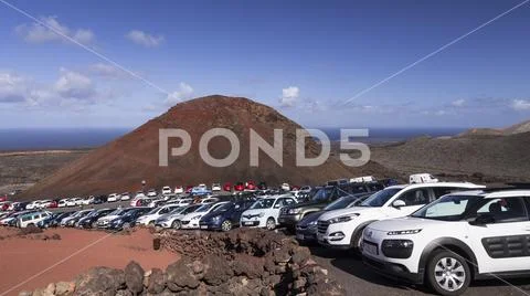 Car park and volcano at Timanfaya National Park, Lanzarote, Canary Islands Stock Photos