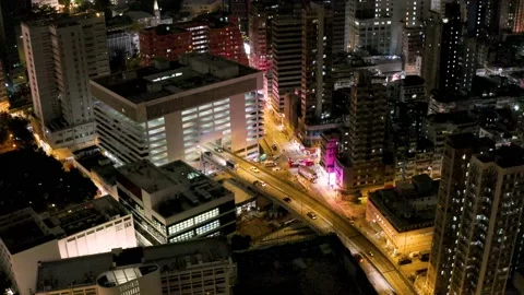 Car Park Building with a unique flyover crossing the building in Hong Kong Stock Footage 144594959