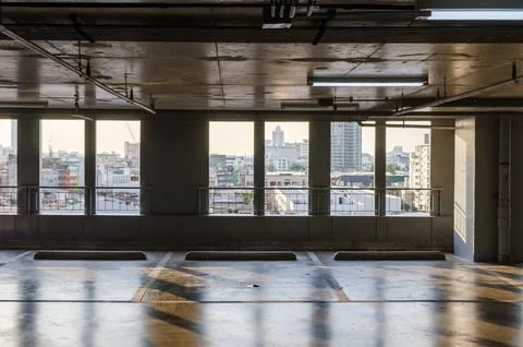 Car park is empty inside the building. Stock Photos
