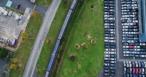 Car park with freight train in aerial view Stock Footage 81665327