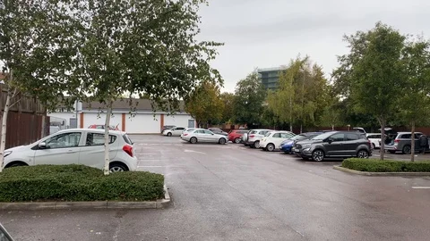 Car park with trees in Bristol Stock Footage 117792878