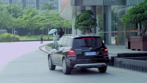 The car is parked in front of the office building Stock Footage 235274166