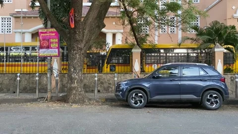 Car parked outside a building Stock Footage 226159932