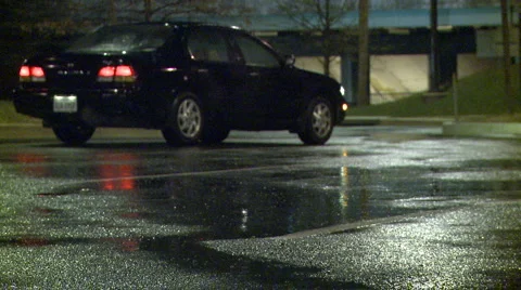 Car parked in the rain (2) Stock Footage 2679012