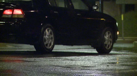 Car parked in the rain (3) Stock Footage 2680182