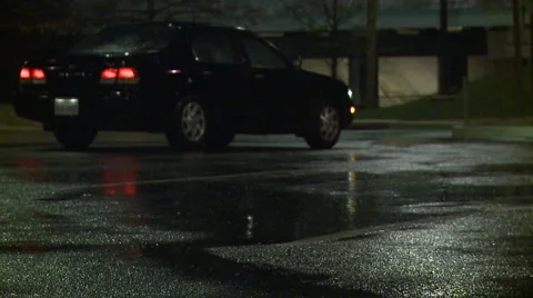 Car parked in the rain (4) Stock Footage 2679548