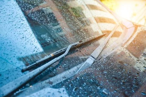 Car parked on road when raining, mirror wiper driver Stock Photos
