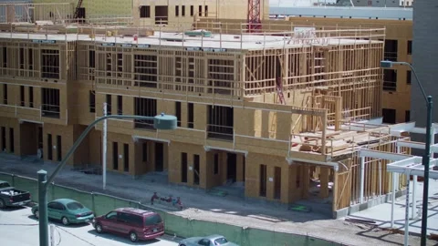 A car parked on the side of a building Stock Footage 155540675