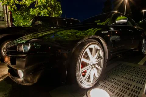 A car parked on the side of a road Stock Photos